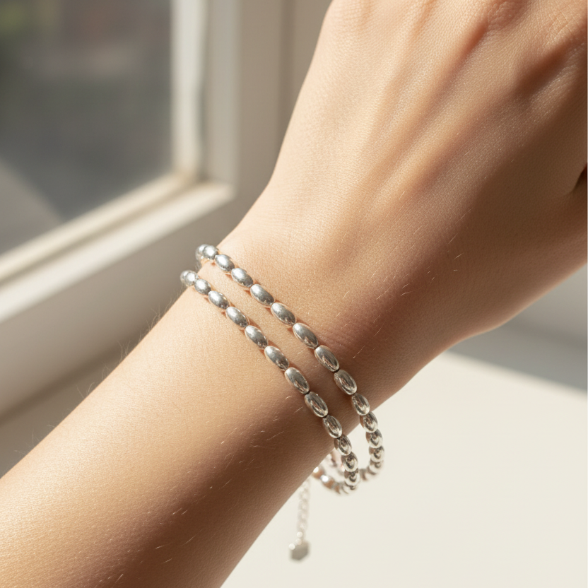 Two Silver Bracelets Natural Pose