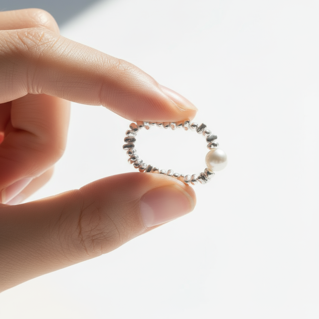 많이 눌린 반지